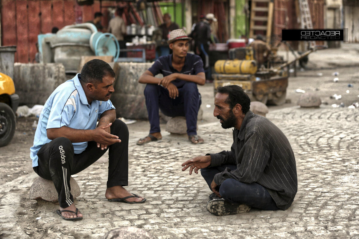 Men talking-in-the-street-in-Baghdad-iraq | detcadeR